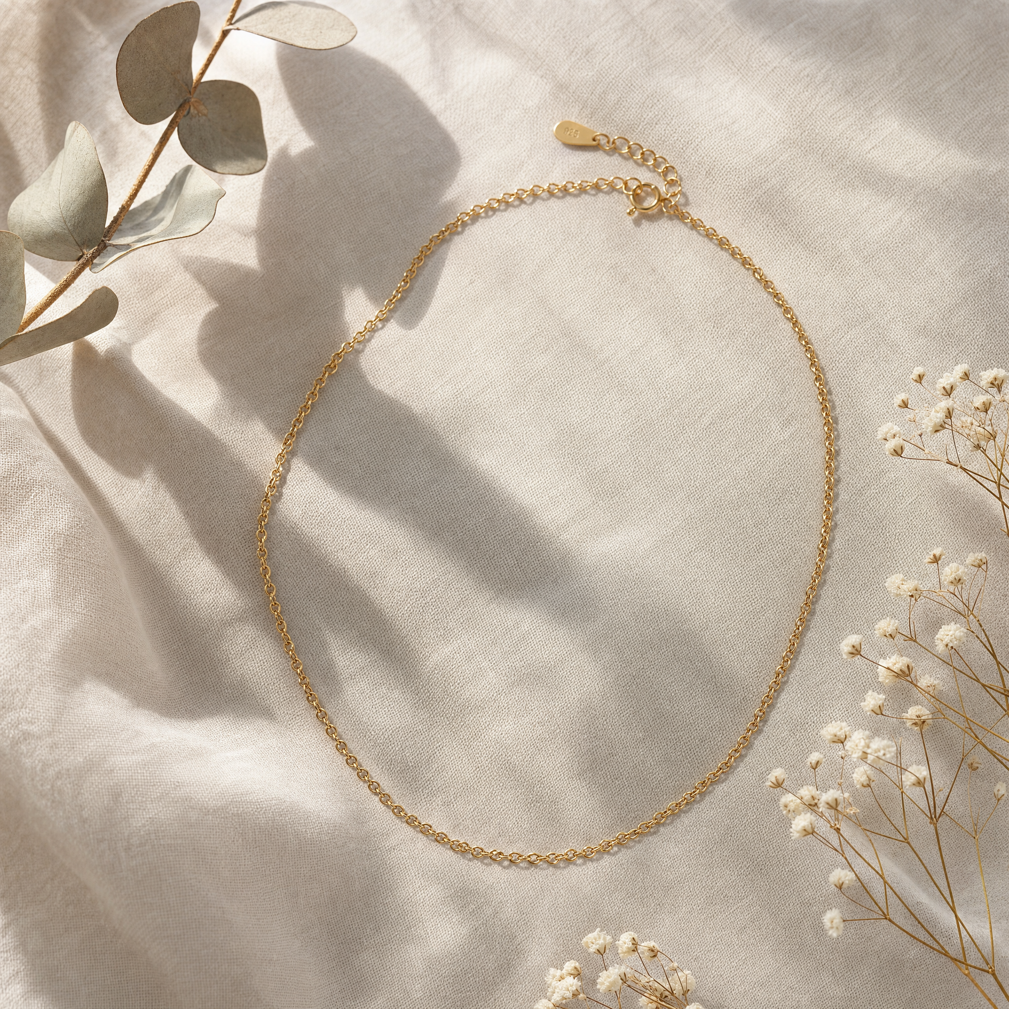 Elara dainty gold chain necklace flat lay — 18K gold plated 925 sterling silver that resists tarnish